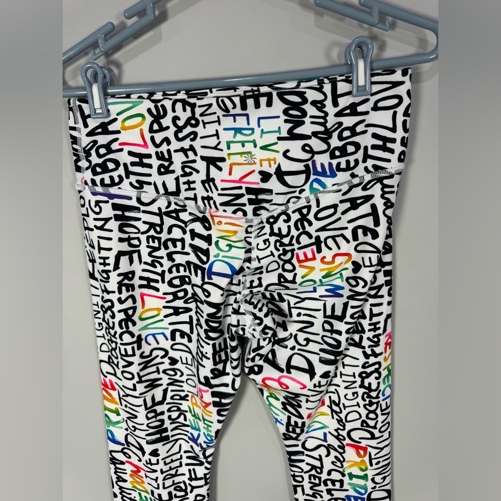 NWOT ATHLETA ELATION TRAIN 7/8
Tight Leggings PRIDE Graffiti words L - Picture 6 of 13
